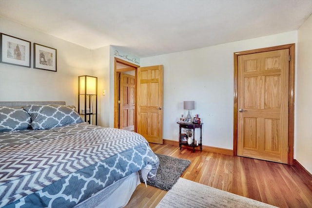 bedroom featuring hardwood / wood-style flooring