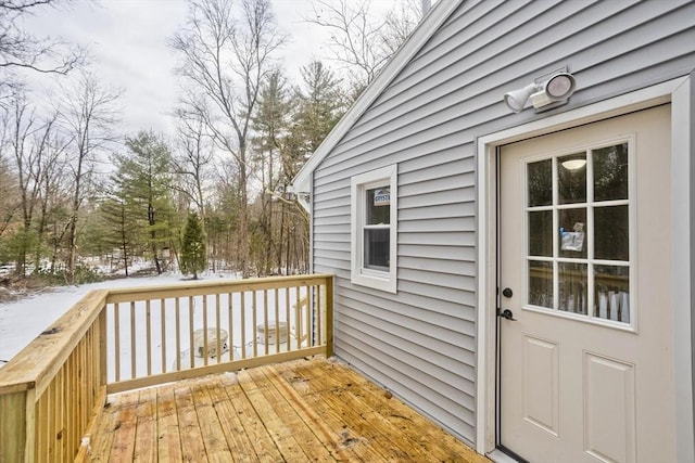 view of snow covered deck