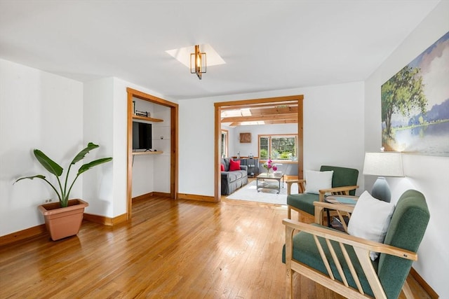 6 Paddock Dr, Harwich, MA 02645 - living area with light wood-style flooring and baseboards