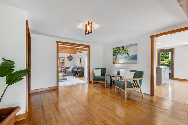6 Paddock Dr, Harwich, MA 02645 - sitting room with light wood-style flooring and baseboards