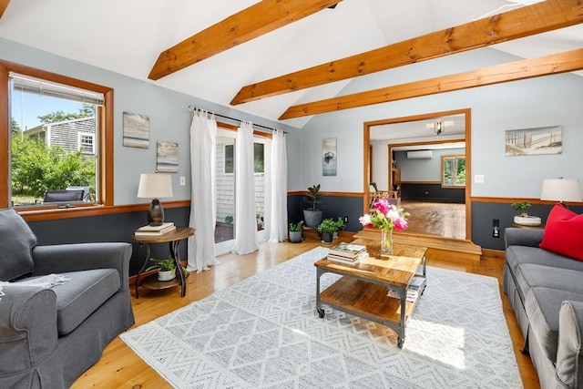 6 Paddock Dr, Harwich, MA 02645 - living area with wainscoting, wood finished floors, and a wall unit AC
