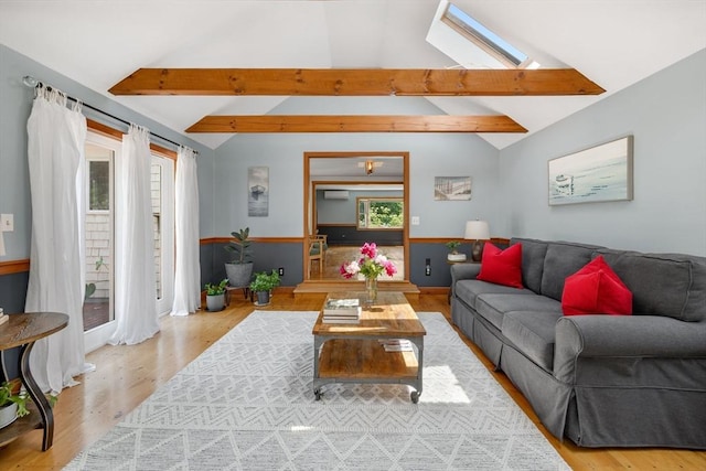 6 Paddock Dr, Harwich, MA 02645 - living room featuring a skylight and wood finished floors
