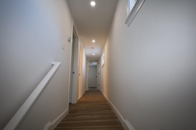 hallway featuring dark hardwood / wood-style floors