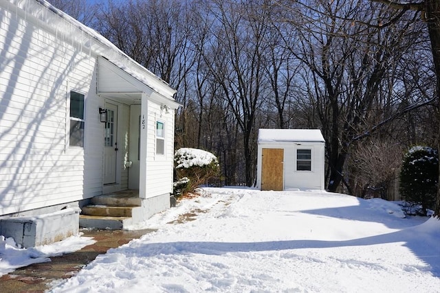 exterior space featuring a storage unit