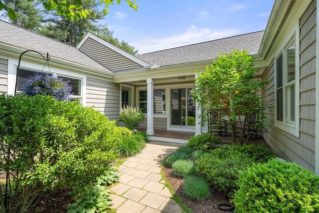 40 Tall Pine Dr Unit 18, Sudbury, MA 01776 - view of exterior entry featuring a shingled roof