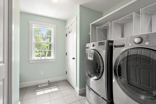 40 Tall Pine Dr Unit 18, Sudbury, MA 01776 - laundry area featuring separate washer and dryer and light tile patterned floors