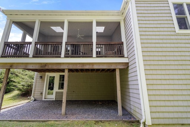 40 Tall Pine Dr Unit 18, Sudbury, MA 01776 - back of property featuring a ceiling fan and a patio area