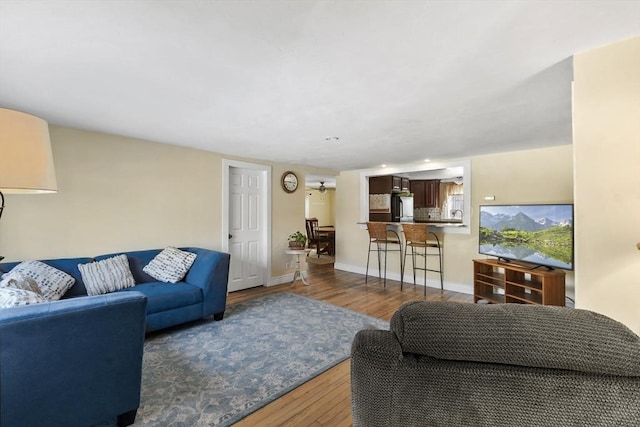 living room featuring dark wood-type flooring