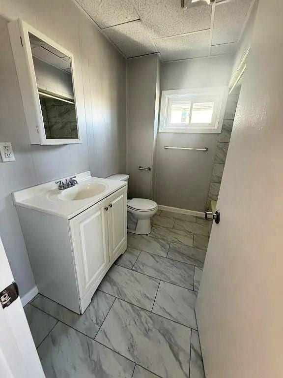 173 County St, Fall River, MA 02723 - bathroom with marble finish flooring and vanity