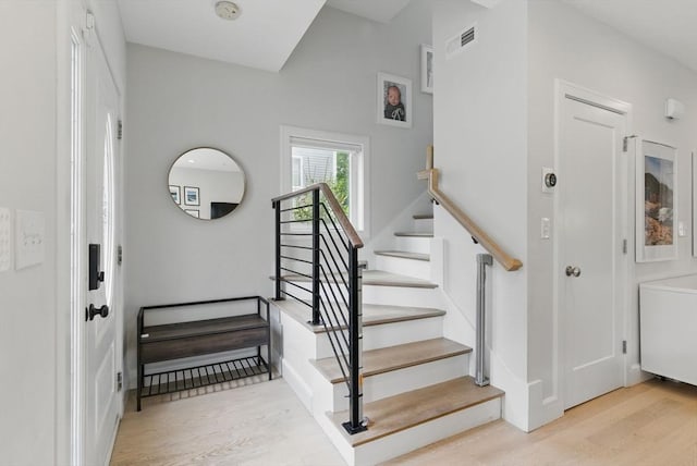54-58 Robey St Unit 54, Boston, MA 02119 - staircase featuring wood finished floors