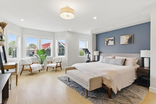 54-58 Robey St Unit 54, Boston, MA 02119 - bedroom with multiple windows, light wood-style floors, recessed lighting, and baseboards