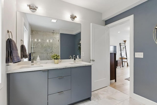 54-58 Robey St Unit 54, Boston, MA 02119 - bathroom with marble finish flooring, a stall shower, double vanity, and baseboards