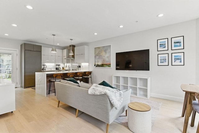 54-58 Robey St Unit 54, Boston, MA 02119 - living room with light wood finished floors, recessed lighting, and baseboards