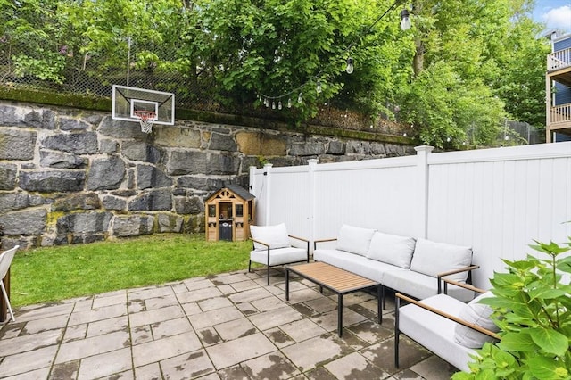 54-58 Robey St Unit 54, Boston, MA 02119 - fenced backyard featuring outdoor lounge area and a patio