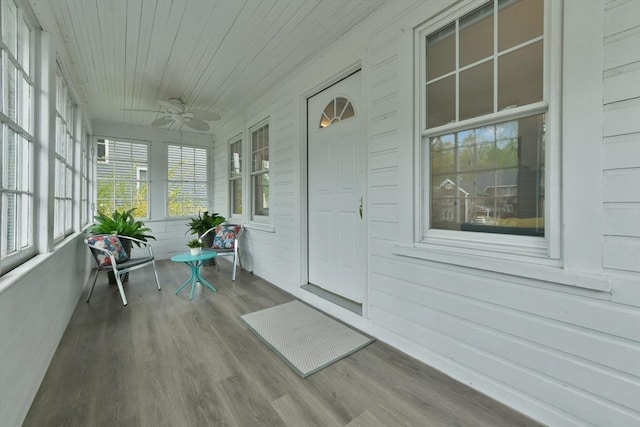 sunroom with a ceiling fan