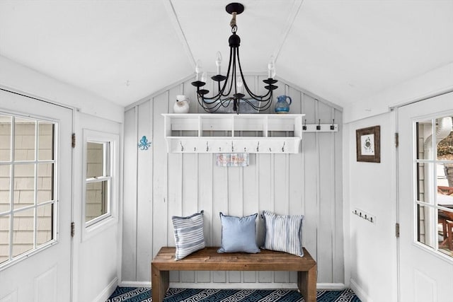 mudroom with vaulted ceiling and a notable chandelier