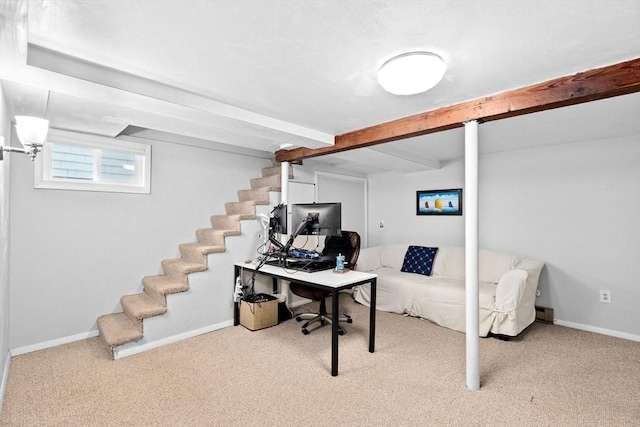 carpeted home office featuring baseboards and beamed ceiling