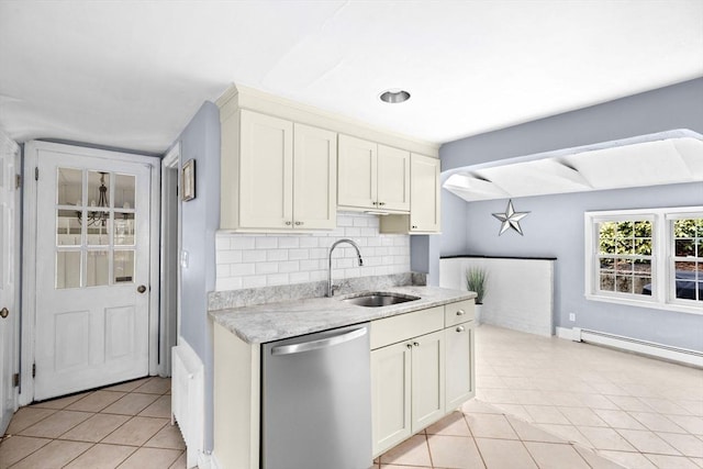 kitchen with a sink, tasteful backsplash, dishwasher, a baseboard radiator, and light tile patterned floors