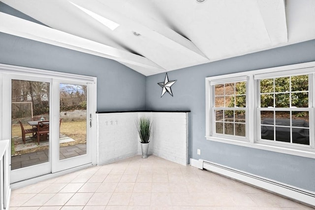 unfurnished sunroom featuring a baseboard radiator and a skylight