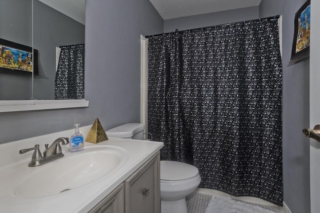 bathroom with a shower with curtain, vanity, a textured ceiling, and toilet