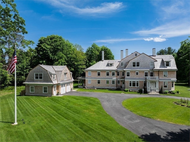 back of house with a yard