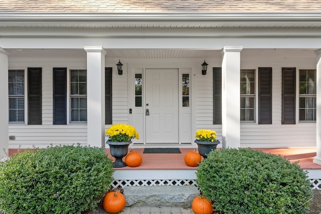 doorway to property featuring a porch