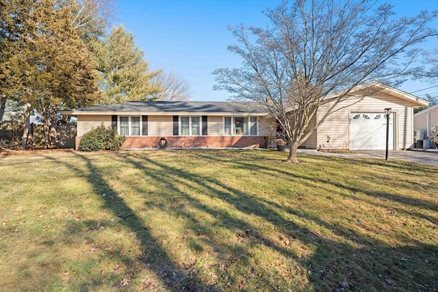 single story home featuring a garage, a front yard, brick siding, and driveway