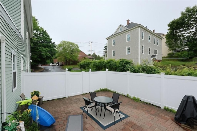 49 Branch St Unit 49, Clinton, MA 01510 - fenced backyard with a patio area and outdoor dining space
