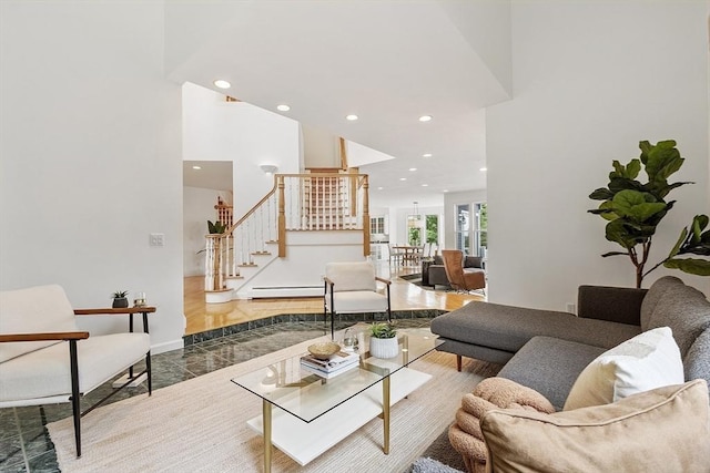 52 S Nelson Rd, Sterling, MA 01564 - living room featuring stairs, recessed lighting, and a baseboard heating unit