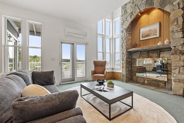 52 S Nelson Rd, Sterling, MA 01564 - living room featuring a wall mounted AC and carpet floors