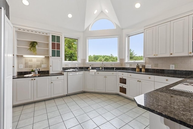 52 S Nelson Rd, Sterling, MA 01564 - kitchen with dishwasher, open shelves, light tile patterned floors, backsplash, and recessed lighting