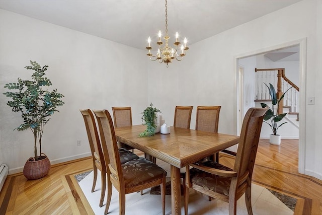 52 S Nelson Rd, Sterling, MA 01564 - dining space featuring a chandelier, light wood finished floors, and baseboard heating
