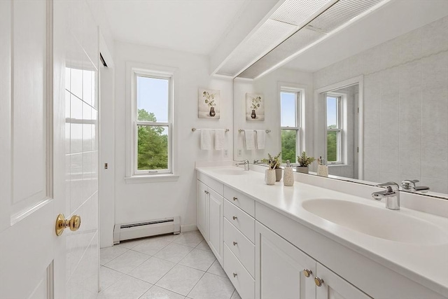 52 S Nelson Rd, Sterling, MA 01564 - bathroom featuring a baseboard heating unit, double vanity, and tile patterned floors