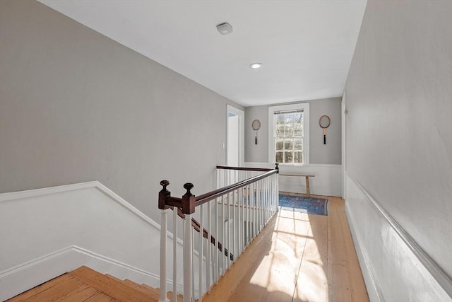 staircase with wood finished floors