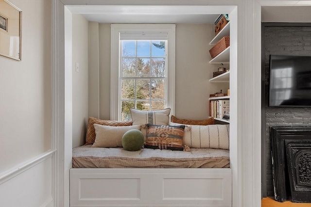 mudroom featuring a fireplace