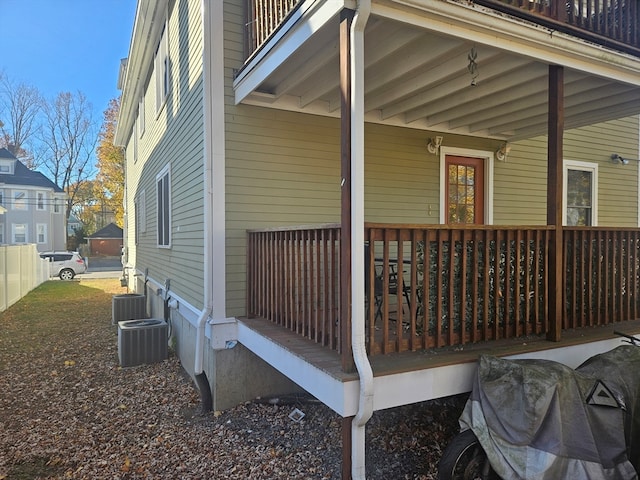 view of side of property with a balcony