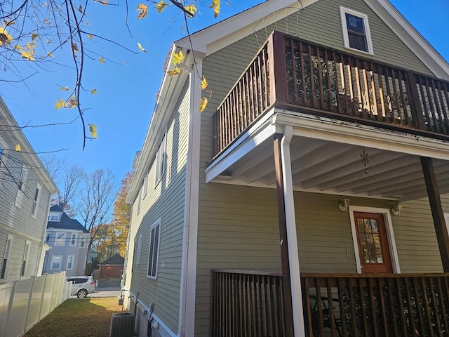 view of property exterior with a balcony