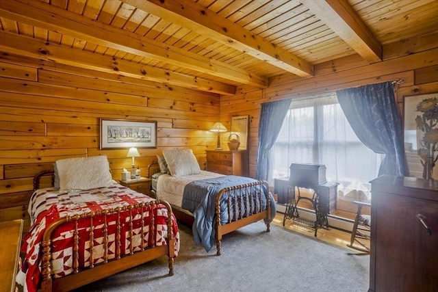 carpeted bedroom with wooden walls, wood ceiling, baseboard heating, and beam ceiling