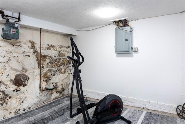 6 A St Unit 6, Northbridge, MA 01588 - workout room featuring electric panel and a textured ceiling