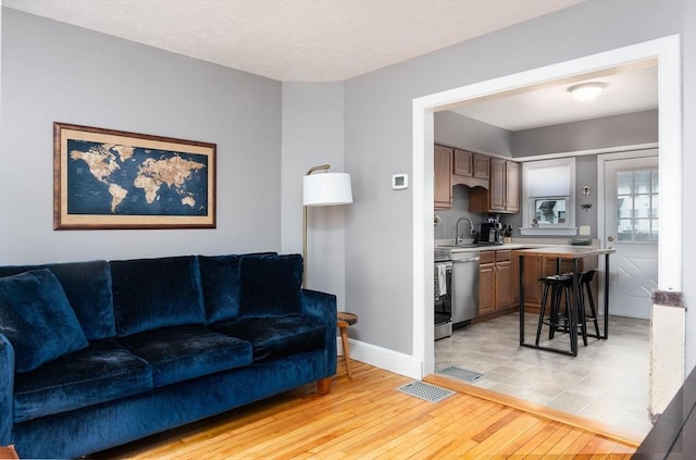 6 A St Unit 6, Northbridge, MA 01588 - living room with light wood finished floors and baseboards