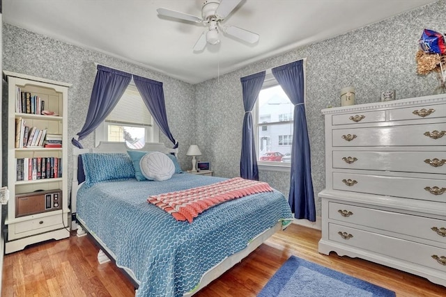 32 Hale Ave, Winthrop, MA 02152 - bedroom featuring wood finished floors, wallpapered walls, and ceiling fan
