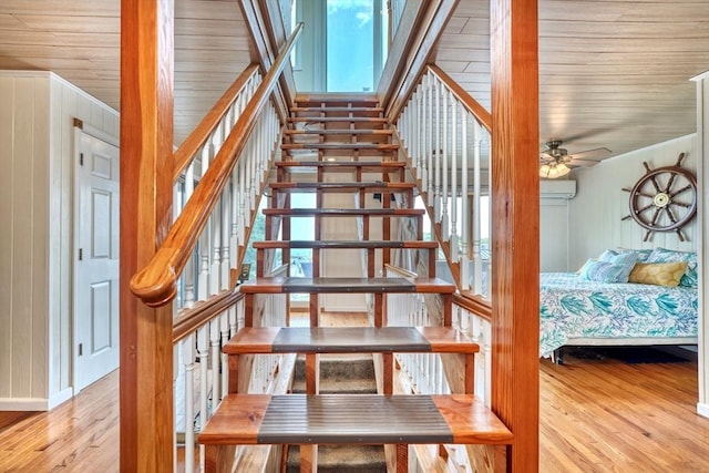 32 Hale Ave, Winthrop, MA 02152 - stairs with wooden ceiling, wood finished floors, a ceiling fan, and wooden walls
