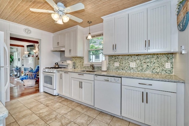 32 Hale Ave, Winthrop, MA 02152 - kitchen with white appliances, under cabinet range hood, wooden ceiling, light tile patterned flooring, and tasteful backsplash