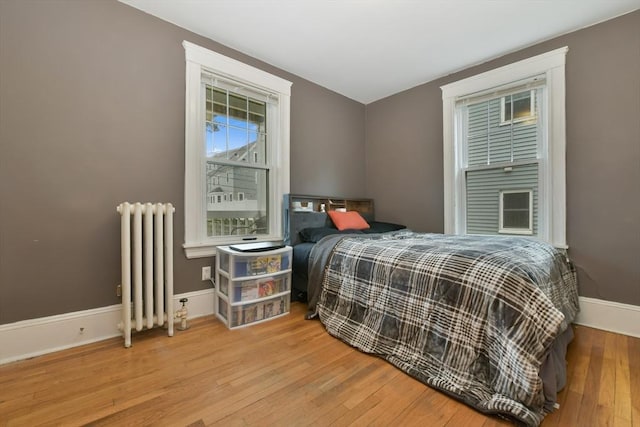 11 Goodway Rd Unit 1, Boston, MA 02130 - bedroom with radiator heating unit and hardwood / wood-style flooring