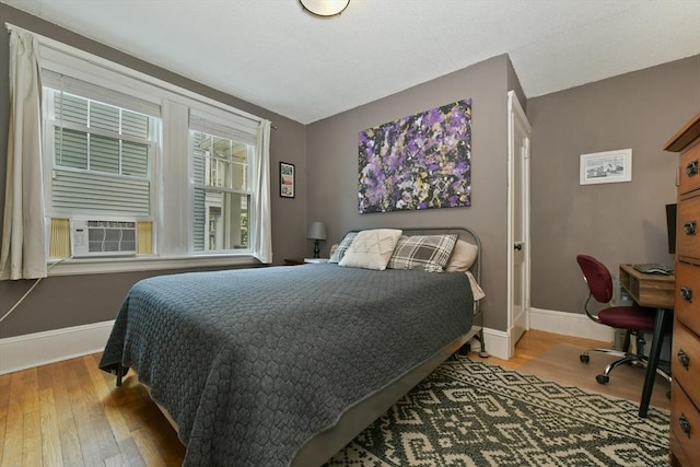 11 Goodway Rd Unit 1, Boston, MA 02130 - bedroom featuring hardwood / wood-style flooring, cooling unit, and a desk