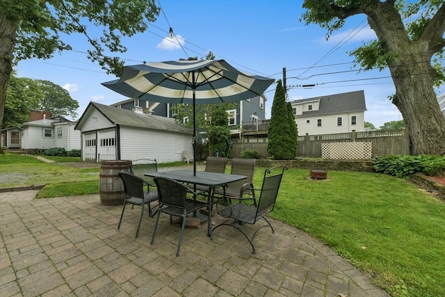 11 Goodway Rd Unit 1, Boston, MA 02130 - view of patio / terrace featuring an outdoor structure, a detached garage, and outdoor dining area