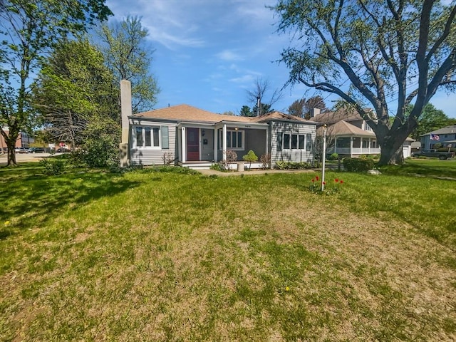 view of front of home with a front yard