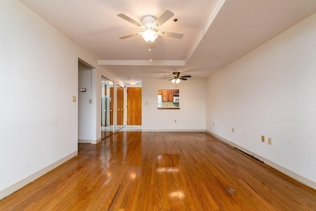 200 Burkhall Unit 103, Weymouth, MA 02190 - unfurnished living room with ceiling fan and light wood finished floors