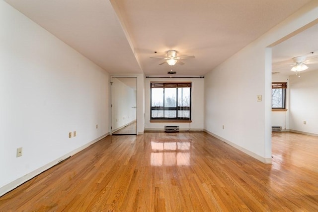 200 Burkhall Unit 103, Weymouth, MA 02190 - empty room with ceiling fan, plenty of natural light, and light wood-style flooring