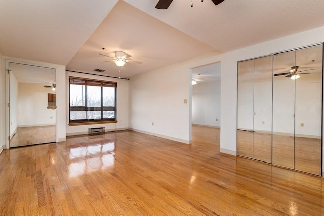 200 Burkhall Unit 103, Weymouth, MA 02190 - unfurnished living room with a ceiling fan and light wood-style floors